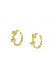 Manguito de la oreja con dos aros lisos. Ear cuff simple de plata con baño de oro.
