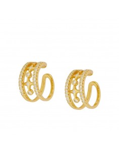 Manguito de la oreja grande con motivos de estrella, cubierto de circonitas blancas. Ear cuff de plata con baño de oro.